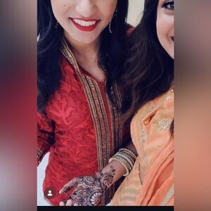 Indian suit with tulip pants Red Embroidered Jacket with Gold Accents